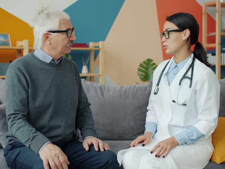 Doctor in a consultation with an older patient