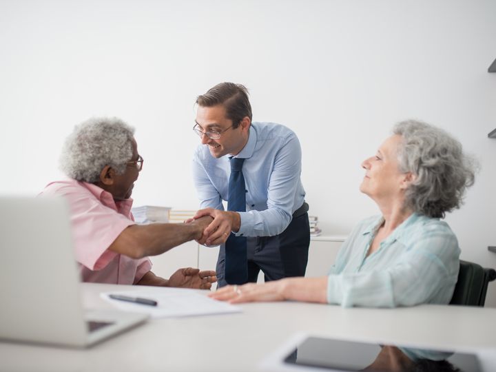Agent greeting an older client